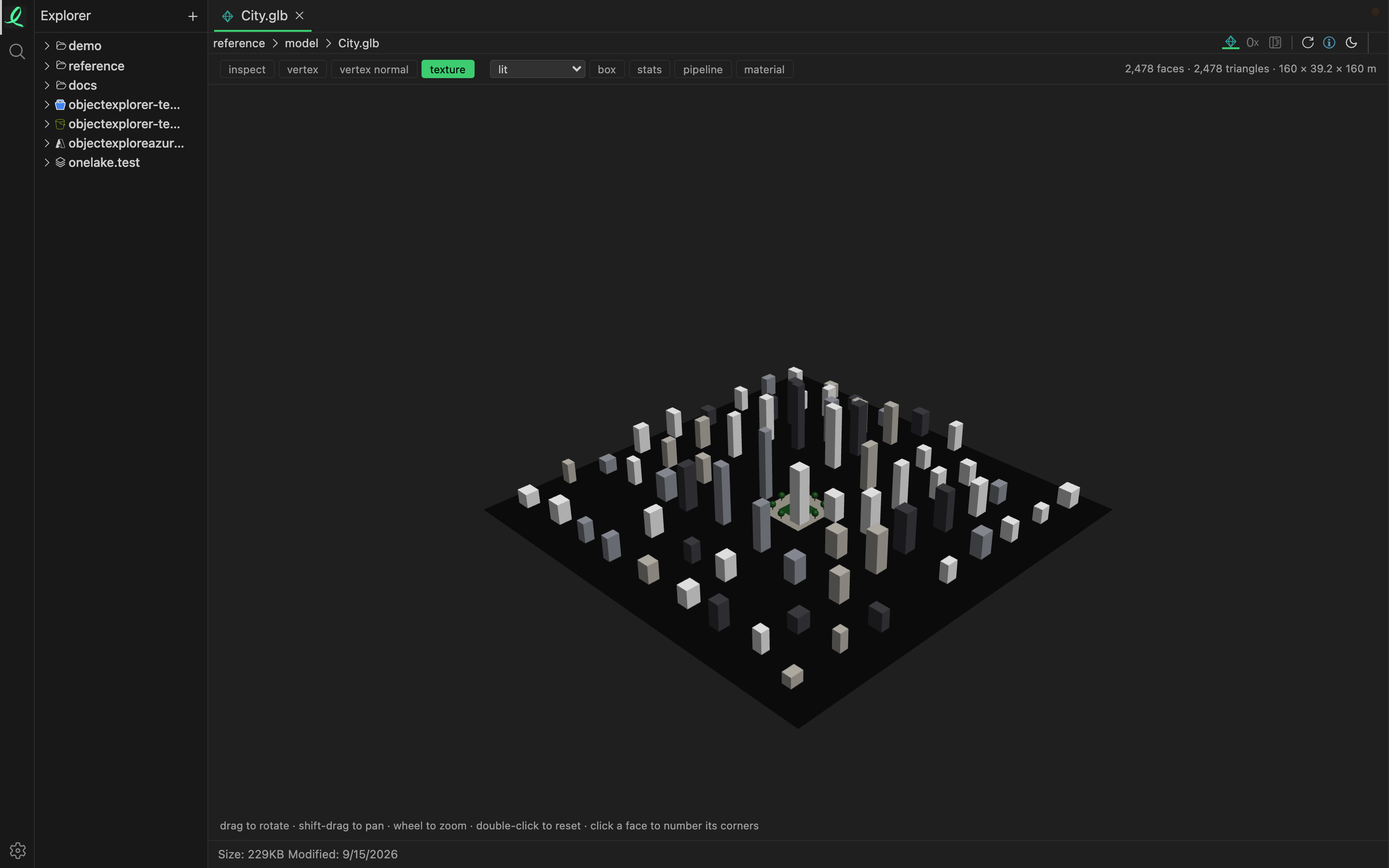 City.glb in the model view: a low-poly city block, with the model toolbar above it